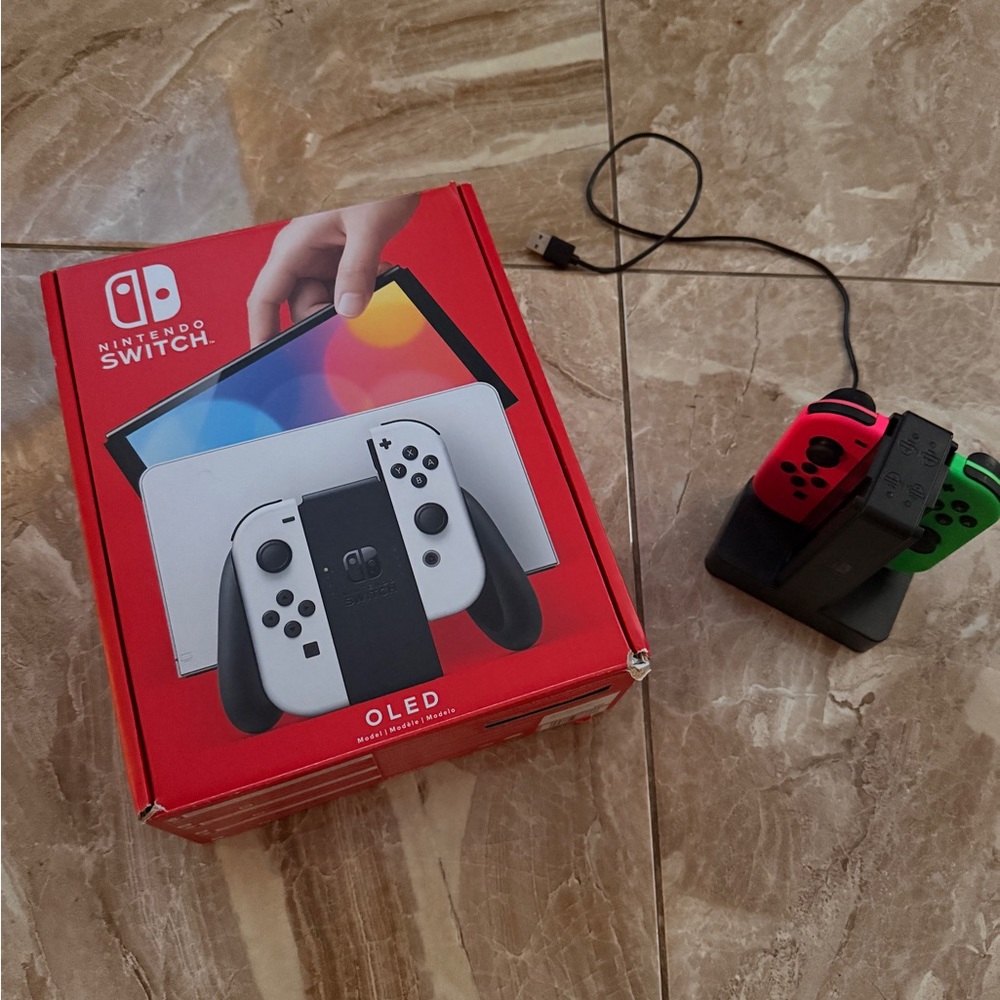 Nintendo Switch OLED with White and extra remotes and charger